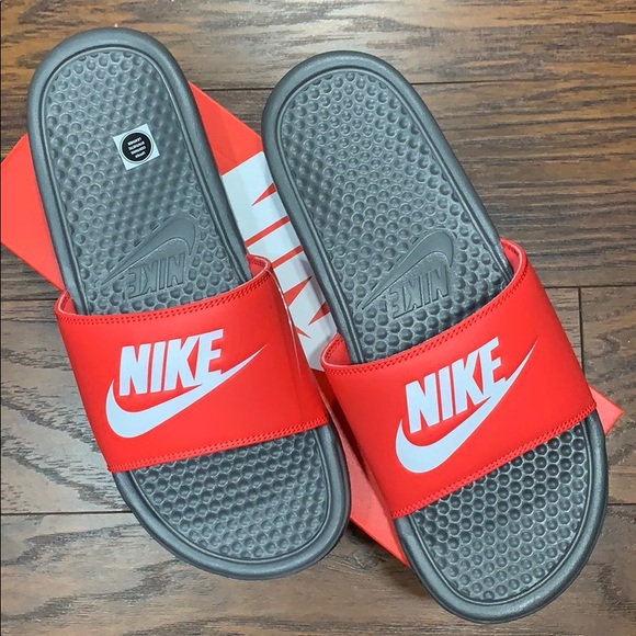 red nike flip flops